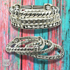 Three piece rhinestone and silver bracelet set