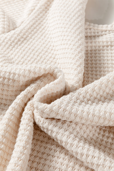 Textured Asymmetric Shoulder Top